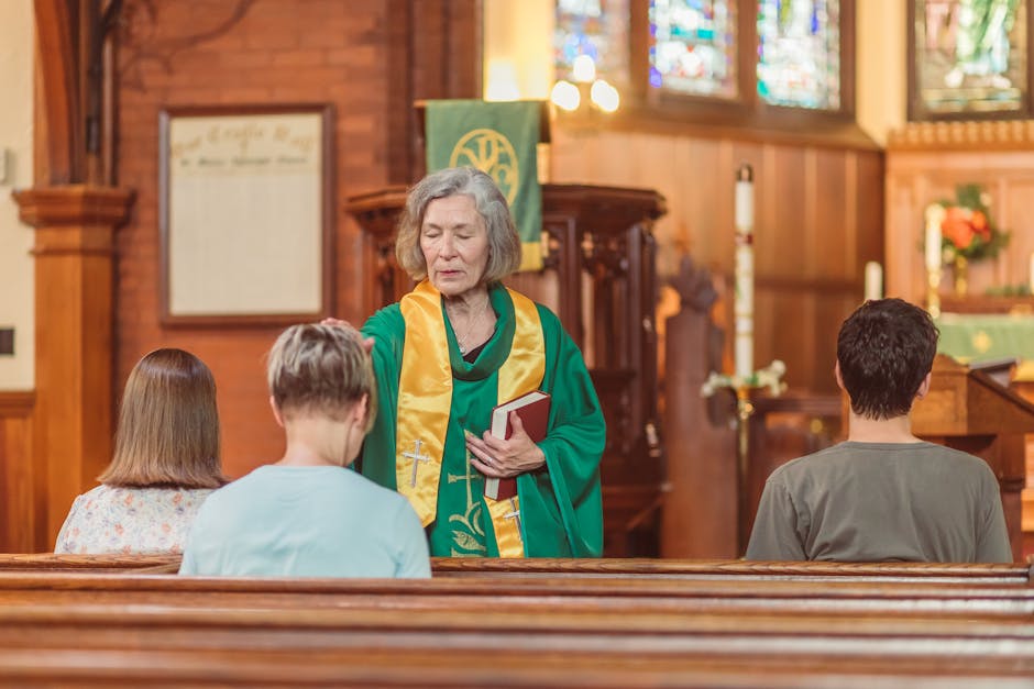 Elderly clergy leading prayer