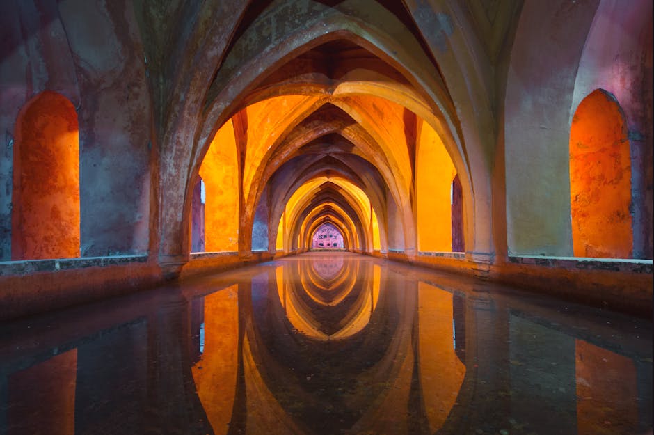 Gothic arches reflecting water