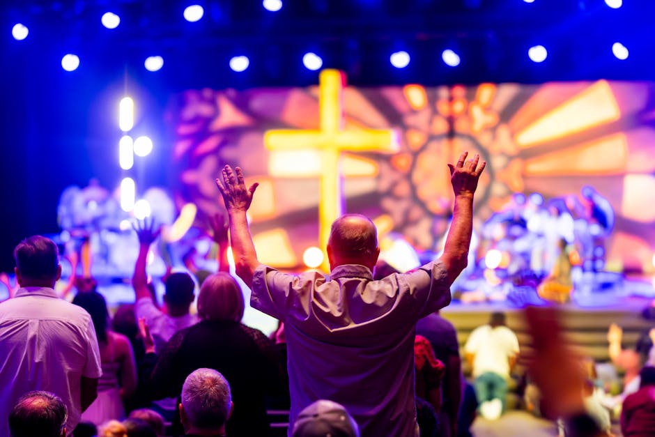 Worshippers hands raised lights